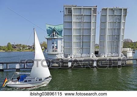 "Opened bascule bridge over the Schlei, Kappeln, Ostseefjord Schlei, a narrow inlet of the Baltic Sea, Schleswig-Holstein, Germany, Europe" View Large Photo Image Stock Photography - "Opened bascule bridge over the Schlei, Kappeln, Ostseefjord Schlei, a narrow inlet of the Baltic Sea, Schleswig-Holstein, Germany, Europe". Fotosearch