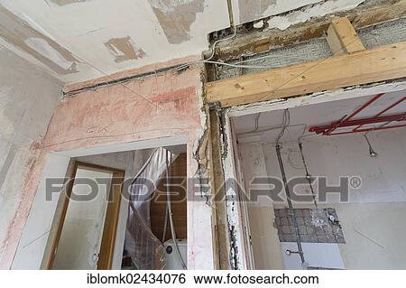 "Opening in a wall with a new beam construction, renovation of an old building, Stuttgart, Baden-Wuerttemberg, Germany, Europe" View Large Photo Image Stock Photograph - "Opening in a wall with a new beam construction, renovation of an old building, Stuttgart, Baden-Wuerttemberg, Germany, Europe". Fotosearch