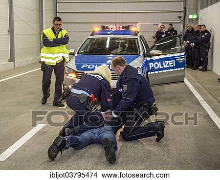 "Operational tactics training for the police, handling of violent combat situations, firearms training, Regional Police Training Centre for Eastern Westphalia" View Large Photo Image Picture - "Operational tactics training for the police, handling of violent combat situations, firearms training, Regional Police Training Centre for Eastern Westphalia". Fotosearch
