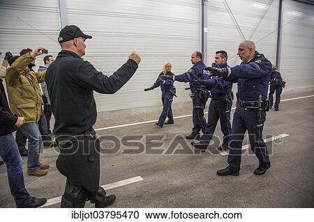 Stock Image - "Operational tactics training for the police, handling of violent combat situations, firearms training, Regional Police Training Centre for Eastern Westphalia". Fotosearch