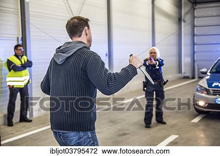 "Operational tactics training for the police, handling of violent combat situations, firearms training, Regional Police Training Centre for Eastern Westphalia" View Large Photo Image Stock Image - "Operational tactics training for the police, handling of violent combat situations, firearms training, Regional Police Training Centre for Eastern Westphalia". Fotosearch