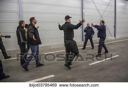 "Operational tactics training for the police, handling of violent combat situations, firearms training, Regional Police Training Centre for Eastern Westphalia" View Large Photo Image Stock Photo - "Operational tactics training for the police, handling of violent combat situations, firearms training, Regional Police Training Centre for Eastern Westphalia". Fotosearch