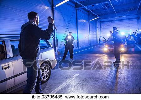 Stock Photography - "Operational tactics training for the police, handling of violent combat situations, firearms training, defence, arrest of a man with a gun, Regional Police Training Centre for Eastern Westphalia". Fotosearch