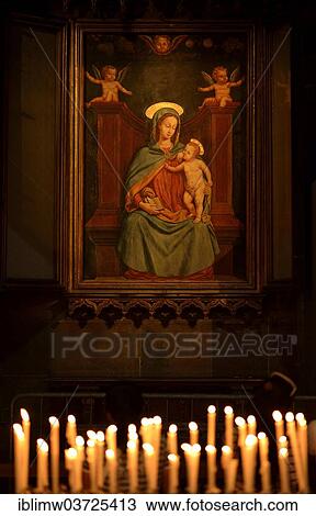 Stock Image - "Opferkerzen before icon of Mary, Milan Cathedral, Milan, Lombardy, Italy, Europe". Fotosearch