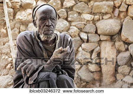 "Oracle priest Mboula, 92, reading the oracle of the crab, Rhumsiki, Far North, Cameroon, Africa" View Large Photo Image Stock Image - "Oracle priest Mboula, 92, reading the oracle of the crab, Rhumsiki, Far North, Cameroon, Africa". Fotosearch