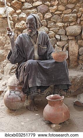 "Oracle priest Mboula, 92, reading the oracle of the crab, Rhumsiki, Far North, Cameroon, Africa" View Large Photo Image Stock Photo - "Oracle priest Mboula, 92, reading the oracle of the crab, Rhumsiki, Far North, Cameroon, Africa". Fotosearch
