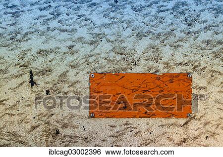 Orange plate on a textured surface View Large Photo Image Stock Photograph - Orange plate on a textured surface. Fotosearch