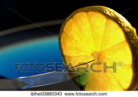 Orange slice on the edge of a glass View Large Photo Image Stock Image - Orange slice on the edge of a glass. Fotosearch