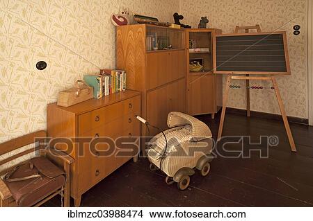 "Original children's room of a family of magistrates from 1930-1960, industrial museum in Lauf an der Pegnitz, Middle Franconia, Bavaria, Germany, Europe" View Large Photo Image Picture - "Original children's room of a family of magistrates from 1930-1960, industrial museum in Lauf an der Pegnitz, Middle Franconia, Bavaria, Germany, Europe". Fotosearch