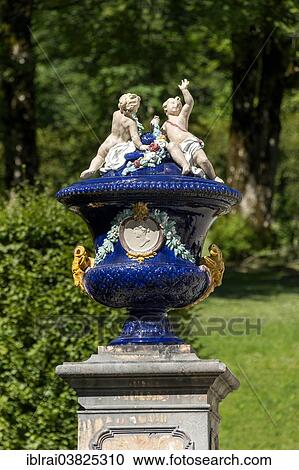 "Ornamental vessel with putti made of glazed ceramic, West Parterre, Schlosspark palace gardens, Schloss Linderhof Palace, Upper Bavaria, Bavaria, Germany, Europe" View Large Photo Image Stock Image - "Ornamental vessel with putti made of glazed ceramic, West Parterre, Schlosspark palace gardens, Schloss Linderhof Palace, Upper Bavaria, Bavaria, Germany, Europe". Fotosearch
