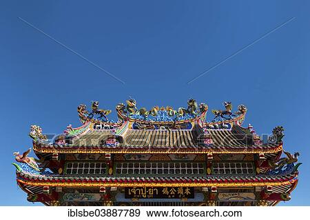 "Ornate roof of the Chinese Chao Pu-Ya Shrine, Thung Sri Muang Park, Udon Thani, Isan or Isaan, Thailand, Asia" View Large Photo Image Stock Photo - "Ornate roof of the Chinese Chao Pu-Ya Shrine, Thung Sri Muang Park, Udon Thani, Isan or Isaan, Thailand, Asia". Fotosearch