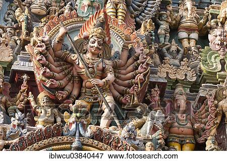 Stock Photo - "Ornate statues on the southern tower, Meenakshi Amman Temple, Madurai, Tamil Nadu, India, Asia". Fotosearch