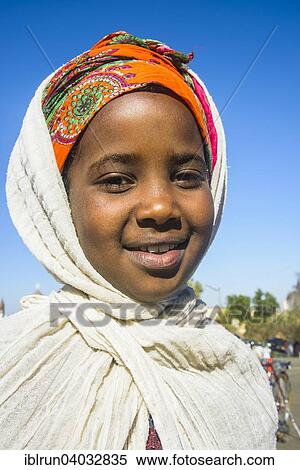 "Orthodox girl dressed for the Easter ceremony, Asmara, Eritrea, Africa" View Large Photo Image Stock Photography - "Orthodox girl dressed for the Easter ceremony, Asmara, Eritrea, Africa". Fotosearch