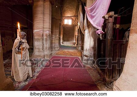 "Orthodox monk in the rock-hewn church of Mikael Imba, Felsenkirche Mikael Imba, Atzbi, Tigray, Ethiopia, Africa" View Large Photo Image Stock Photo - "Orthodox monk in the rock-hewn church of Mikael Imba, Felsenkirche Mikael Imba, Atzbi, Tigray, Ethiopia, Africa". Fotosearch