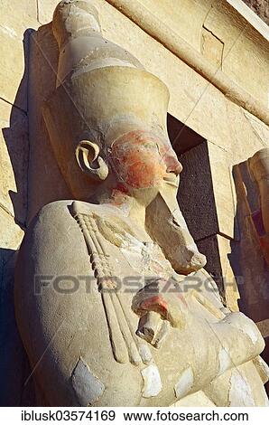 Stock Photo - "Osiris statue on the facade of the Temple of Hatshepsut, Deir el-Bahari, Luxor, Luxor Governorate, Egypt, Africa". Fotosearch