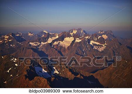 "Otztal Alps and the Kaunergrat Range with Mt Watzespitze, from Mt Schrankogel, near Gries, Tyrol, Austria, Europe" View Large Photo Image Stock Photo - "Otztal Alps and the Kaunergrat Range with Mt Watzespitze, from Mt Schrankogel, near Gries, Tyrol, Austria, Europe". Fotosearch