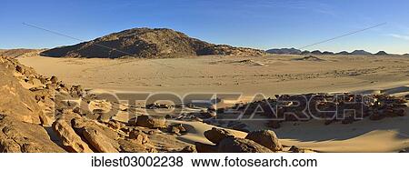 "Oued or Wadi Adenek, Sahara desert, Teffedest Mountains, Oued or Wadi Adenek, Tamanrasset Province, Algeria, Africa" View Large Photo Image Stock Photo - "Oued or Wadi Adenek, Sahara desert, Teffedest Mountains, Oued or Wadi Adenek, Tamanrasset Province, Algeria, Africa". Fotosearch
