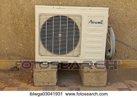 "Outdoor air conditioning unit, on the roof of a kasbah, Merzouga, Meknes-Tafilalet region, Morocco, Africa" View Large Photo Image Stock Image - "Outdoor air conditioning unit, on the roof of a kasbah, Merzouga, Meknes-Tafilalet region, Morocco, Africa". Fotosearch
