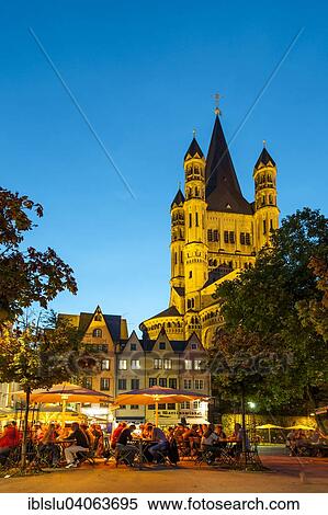 "Outdoor cafes in Fischmarkt square with Great St. Martin Church in the evening, historic centre, Cologne, North Rhine-Westphalia, Germany, Europe" View Large Photo Image Stock Photography - "Outdoor cafes in Fischmarkt square with Great St. Martin Church in the evening, historic centre, Cologne, North Rhine-Westphalia, Germany, Europe". Fotosearch