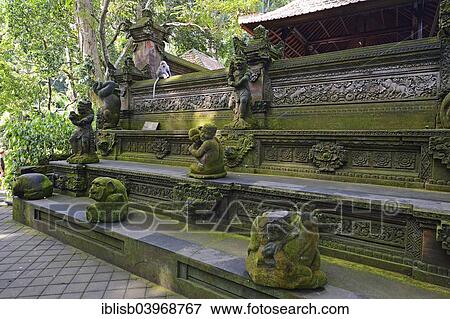 "Outer wall with statues of various gods at the Pura Dalem Agung Padangtegal temple in Ubud Monkey Forest, Ubud, Bali, Indonesia, Asia" View Large Photo Image Stock Photo - "Outer wall with statues of various gods at the Pura Dalem Agung Padangtegal temple in Ubud Monkey Forest, Ubud, Bali, Indonesia, Asia". Fotosearch