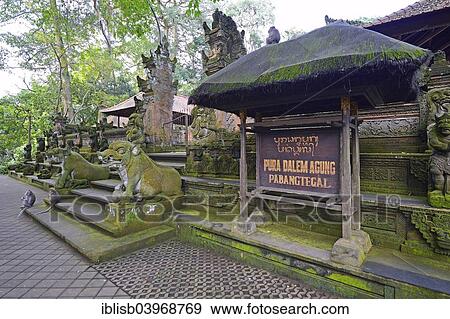 "Outer wall with statues of various gods at the Pura Dalem Agung Padangtegal temple in Ubud Monkey Forest, Ubud, Bali, Indonesia, Asia" View Large Photo Image Stock Photo - "Outer wall with statues of various gods at the Pura Dalem Agung Padangtegal temple in Ubud Monkey Forest, Ubud, Bali, Indonesia, Asia". Fotosearch
