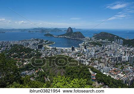 Picture - "Outlook from the Christ the Redeemer statue over Rio de Janeiro and the Sugar Loaf, Brazil, South America". Fotosearch