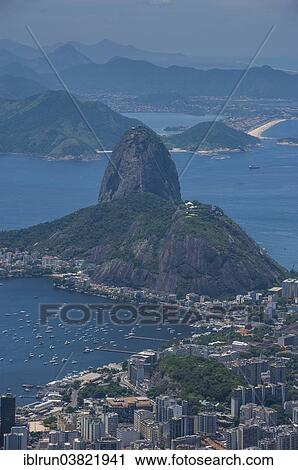 "Outlook from the Christ the Redeemer statue over Rio de Janeiro and the Sugar Loaf, Brazil, South America" View Large Photo Image Stock Image - "Outlook from the Christ the Redeemer statue over Rio de Janeiro and the Sugar Loaf, Brazil, South America". Fotosearch