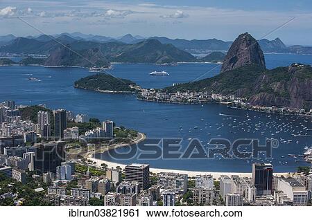 "Outlook from the Christ the Redeemer statue over Rio de Janeiro and the Sugar Loaf, Brazil, South America" View Large Photo Image Stock Image - "Outlook from the Christ the Redeemer statue over Rio de Janeiro and the Sugar Loaf, Brazil, South America". Fotosearch
