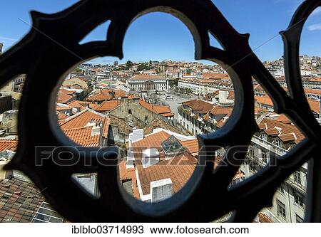 "Outlook through a wrought iron grid of Santa Justa Elevator, Elevador de Santa Justa or Elevador do Carmo, over the historic city centre of Lisbon with red roofs, Baixa, Lisbon, Lisbon District, Portugal, Europe" View Large Photo Image Stock Image - "Outlook through a wrought iron grid of Santa Justa Elevator, Elevador de Santa Justa or Elevador do Carmo, over the historic city centre of Lisbon with red roofs, Baixa, Lisbon, Lisbon District, Portugal, Europe". Fotosearch