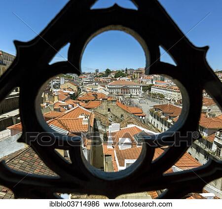"Outlook through a wrought iron grid of Santa Justa Elevator, Elevador de Santa Justa or Elevador do Carmo, over the historic city centre of Lisbon with red roofs, Baixa, Lisbon, Lisbon District, Portugal, Europe" View Large Photo Image Stock Photograph - "Outlook through a wrought iron grid of Santa Justa Elevator, Elevador de Santa Justa or Elevador do Carmo, over the historic city centre of Lisbon with red roofs, Baixa, Lisbon, Lisbon District, Portugal, Europe". Fotosearch