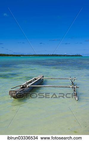 "Outrigger in the turquoise waters, Ile des Pins, New Caledonia, France, Oceania" View Large Photo Image Picture - "Outrigger in the turquoise waters, Ile des Pins, New Caledonia, France, Oceania". Fotosearch