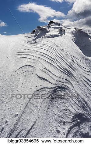 "Overhanging snow with wind grooves or Sastrugi ridges, at Mt Wildkamm, Niederalpl, Murzsteg Alps, Styria, Austria, Europe" View Large Photo Image Stock Photography - "Overhanging snow with wind grooves or Sastrugi ridges, at Mt Wildkamm, Niederalpl, Murzsteg Alps, Styria, Austria, Europe". Fotosearch