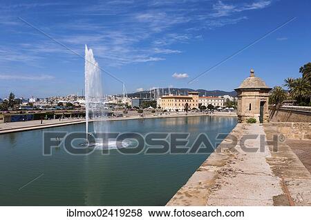 Overlooking the lake towards La Seu Cathedral, headquarters building of Aduana, historic town centre, Palma de Mallorca, Majorca, Balearic Islands, Spain, Europe View Large Photo Image Stock Photo - Overlooking the lake towards La Seu Cathedral, headquarters building of Aduana, historic town centre, Palma de Mallorca, Majorca, Balearic Islands, Spain, Europe. Fotosearch