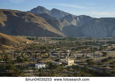 Stock Image - "Overlooking the town with a mosque at the front, Bukha, Musandam, Oman, Asia". Fotosearch