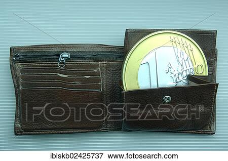 Oversized euro coin in a wallet View Large Photo Image Stock Photo - Oversized euro coin in a wallet. Fotosearch