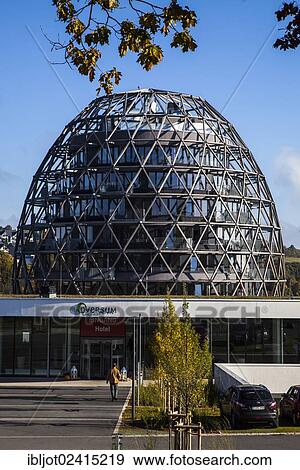 Oversum Hotel, a hotel, spa and conference hall shaped like an egg, on the Kurpark spa gardens in Winterberg, Winterberg, Sauerland, North Rhine-Westphalia, Germany, Europe View Large Photo Image Stock Photo - Oversum Hotel, a hotel, spa and conference hall shaped like an egg, on the Kurpark spa gardens in Winterberg, Winterberg, Sauerland, North Rhine-Westphalia, Germany, Europe. Fotosearch