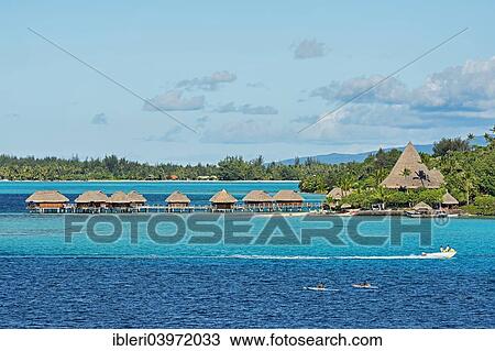 Stock Image - "Overwater bungalows, lagoon, Bora Bora, French Polynesia, Oceania". Fotosearch