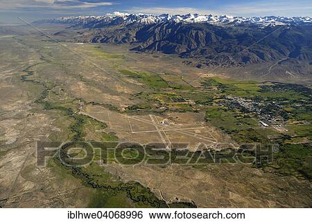 "Owens Valley, valley of the Owens River, on the horizon the Sierra Nevada, near Bishop, California, United States, North America" View Large Photo Image Stock Photograph - "Owens Valley, valley of the Owens River, on the horizon the Sierra Nevada, near Bishop, California, United States, North America". Fotosearch