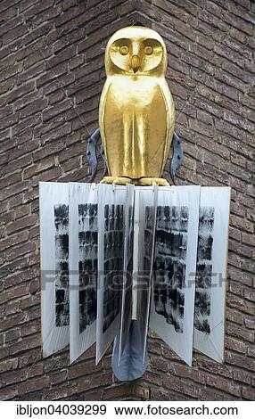"Owl on a book as the sign of a book shop, Luneburg, Lower Saxony, Germany, Europe" View Large Photo Image Stock Photo - "Owl on a book as the sign of a book shop, Luneburg, Lower Saxony, Germany, Europe". Fotosearch
