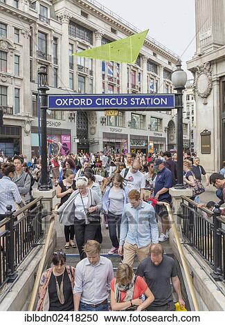 Stock Image - Oxford Circus underground entrance with crowds of people, London, England, United Kingdom, Europe. Fotosearch