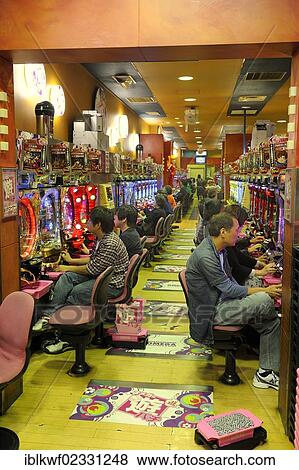 "Pachinko, gambling devices, giant amusement arcade with slot machines, the most popular gambling game in Japan, Kyoto, East Asia, Asia" View Large Photo Image Stock Photo - "Pachinko, gambling devices, giant amusement arcade with slot machines, the most popular gambling game in Japan, Kyoto, East Asia, Asia". Fotosearch