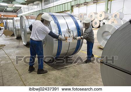 "Packaging of galvanised or zinc-coated sheet metal wound into coils for the automotive industry, galvanising line, shipping department, Salzgitter AG Steel Mill, Salzgitter, Lower Saxony, Germany, Europe" View Large Photo Image Stock Image - "Packaging of galvanised or zinc-coated sheet metal wound into coils for the automotive industry, galvanising line, shipping department, Salzgitter AG Steel Mill, Salzgitter, Lower Saxony, Germany, Europe". Fotosearch