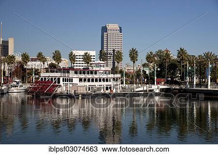 Stock Image - "Paddle steamer """"Grand Romance"""" in the harbour, with the Shoreline Aquatic Park, Long Beach, Los Angeles County, California, United States, North America". Fotosearch