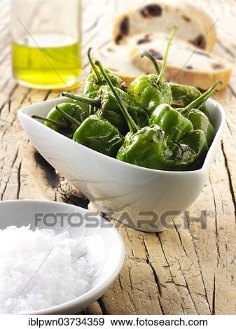 Padron peppers snack with sea salt View Large Photo Image Stock Photo - Padron peppers snack with sea salt. Fotosearch