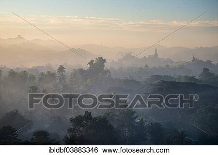 "Pagoda in the mist, in the morning light, Mrauk U, Sittwe District, Rakhine State, Myanmar, Asia" View Large Photo Image Stock Photograph - "Pagoda in the mist, in the morning light, Mrauk U, Sittwe District, Rakhine State, Myanmar, Asia". Fotosearch