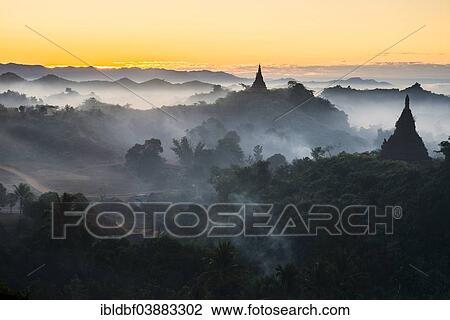"Pagodas surrounded by trees, in the mist, Mrauk U, Sittwe District, Rakhine State, Myanmar, Asia" View Large Photo Image Stock Image - "Pagodas surrounded by trees, in the mist, Mrauk U, Sittwe District, Rakhine State, Myanmar, Asia". Fotosearch