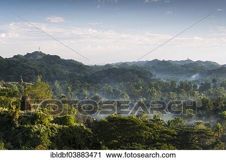 "Pagodas surrounded by trees, in the mist, Mrauk U, Sittwe District, Rakhine State, Myanmar, Asia" View Large Photo Image Stock Image - "Pagodas surrounded by trees, in the mist, Mrauk U, Sittwe District, Rakhine State, Myanmar, Asia". Fotosearch