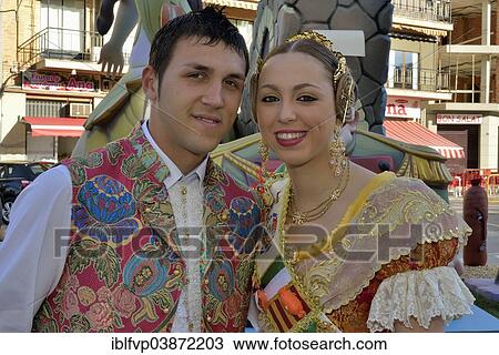 "Pair from the Falla group """"La Font"""" wearing traditional dress at the Las Fallas Spring Festival, Pego, Province of Alicante, Spain, Europe" View Large Photo Image Stock Image - "Pair from the Falla group """"La Font"""" wearing traditional dress at the Las Fallas Spring Festival, Pego, Province of Alicante, Spain, Europe". Fotosearch