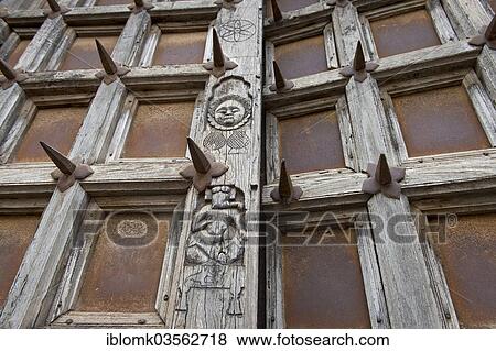 "Palace gate fortified with iron spikes, representation of the elephant-headed god Ganesha and the sun, Taragarh Fort, Bundi, Rajasthan, India, Asia" View Large Photo Image Stock Photo - "Palace gate fortified with iron spikes, representation of the elephant-headed god Ganesha and the sun, Taragarh Fort, Bundi, Rajasthan, India, Asia". Fotosearch