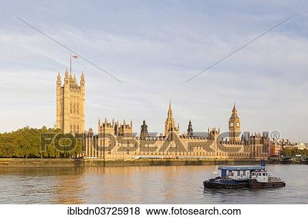 Stock Photo - "Palace of Westminster, or Houses of Parliament, with Victoria Tower, on the River Thames in the morning light, London, London region, England, United Kingdom, Europe". Fotosearch
